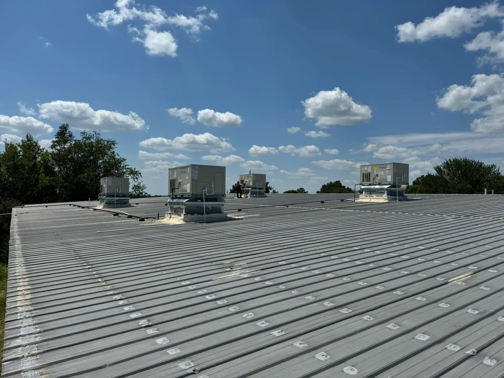 Commercial rooftop HVAC units serviced by Okla-Home technicians in Tulsa